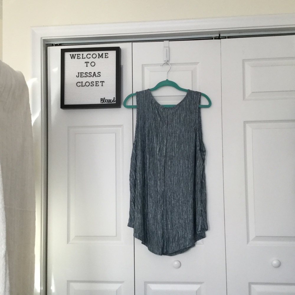 Amana size 3 blouse soft silvery color.